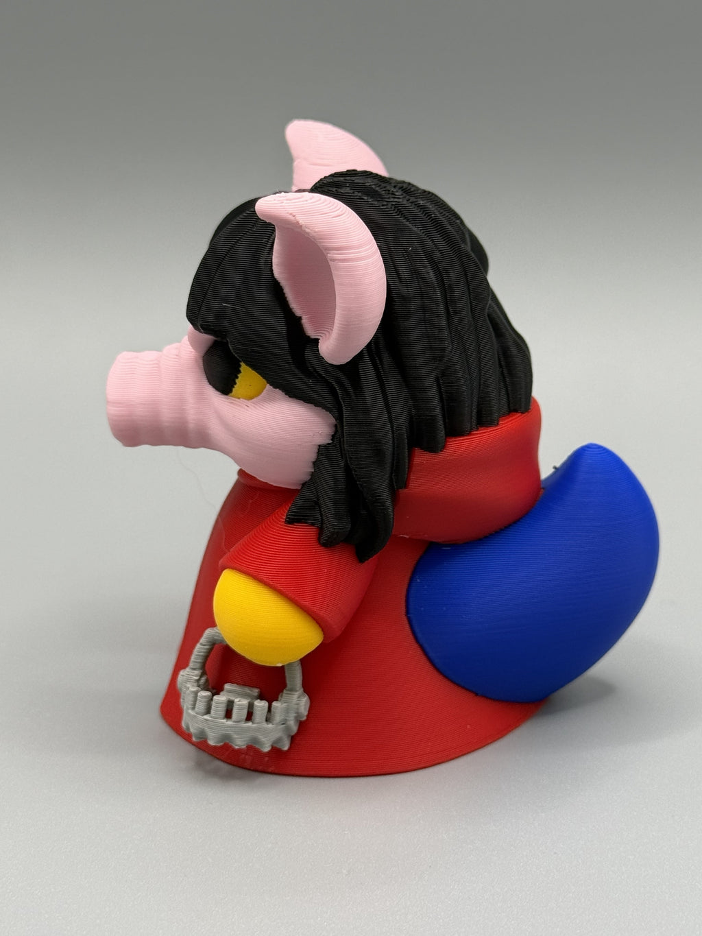 Pig Mask Duck side view showing skeleton hand accessory