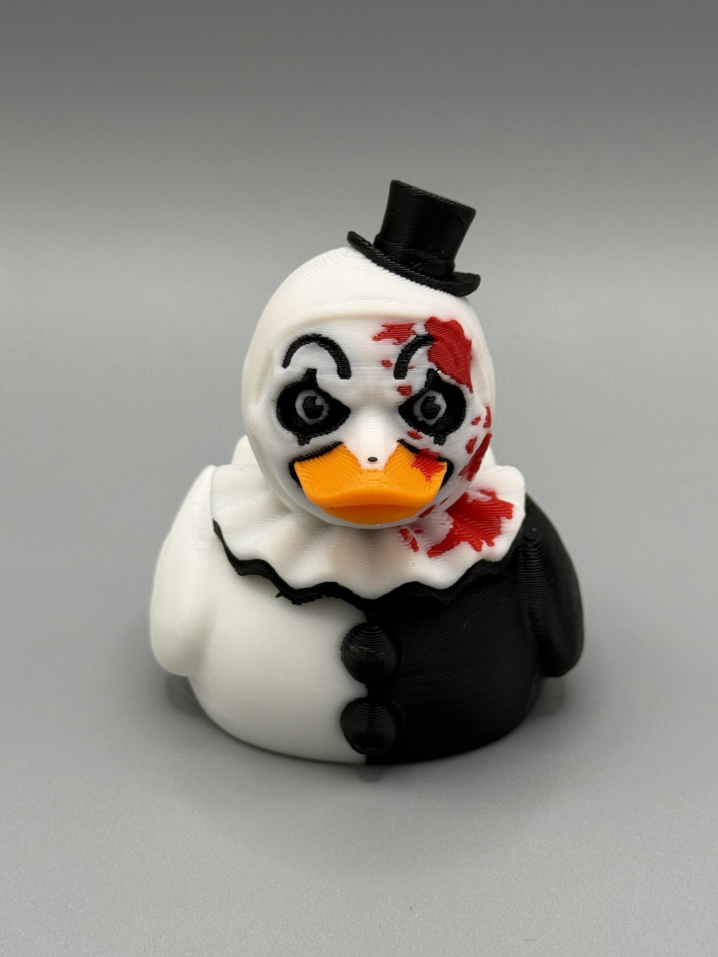 Art the Clown Duck side view – showing ruffled collar and top hat