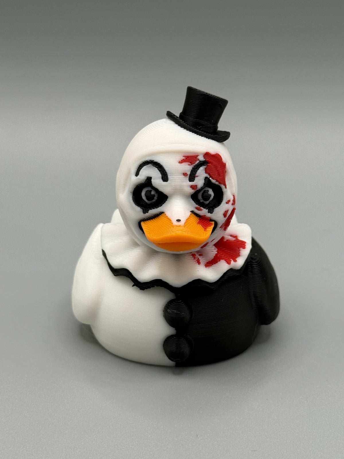 Art the Clown Duck side view – showing ruffled collar and top hat