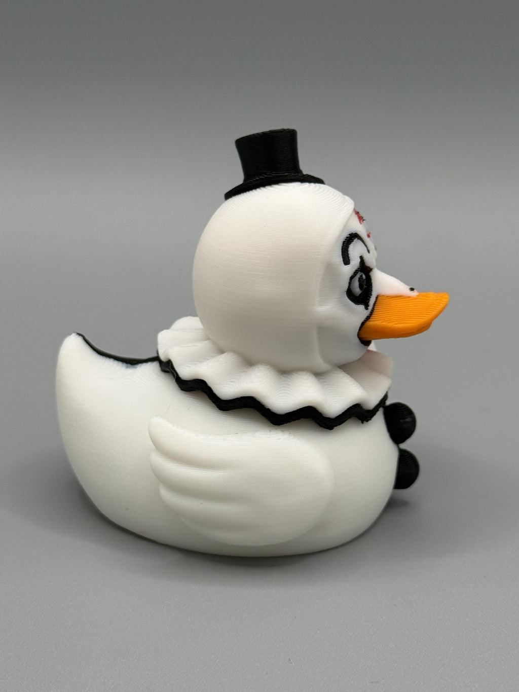 Art the Clown Duck front view – blood-splattered face and black eye makeup