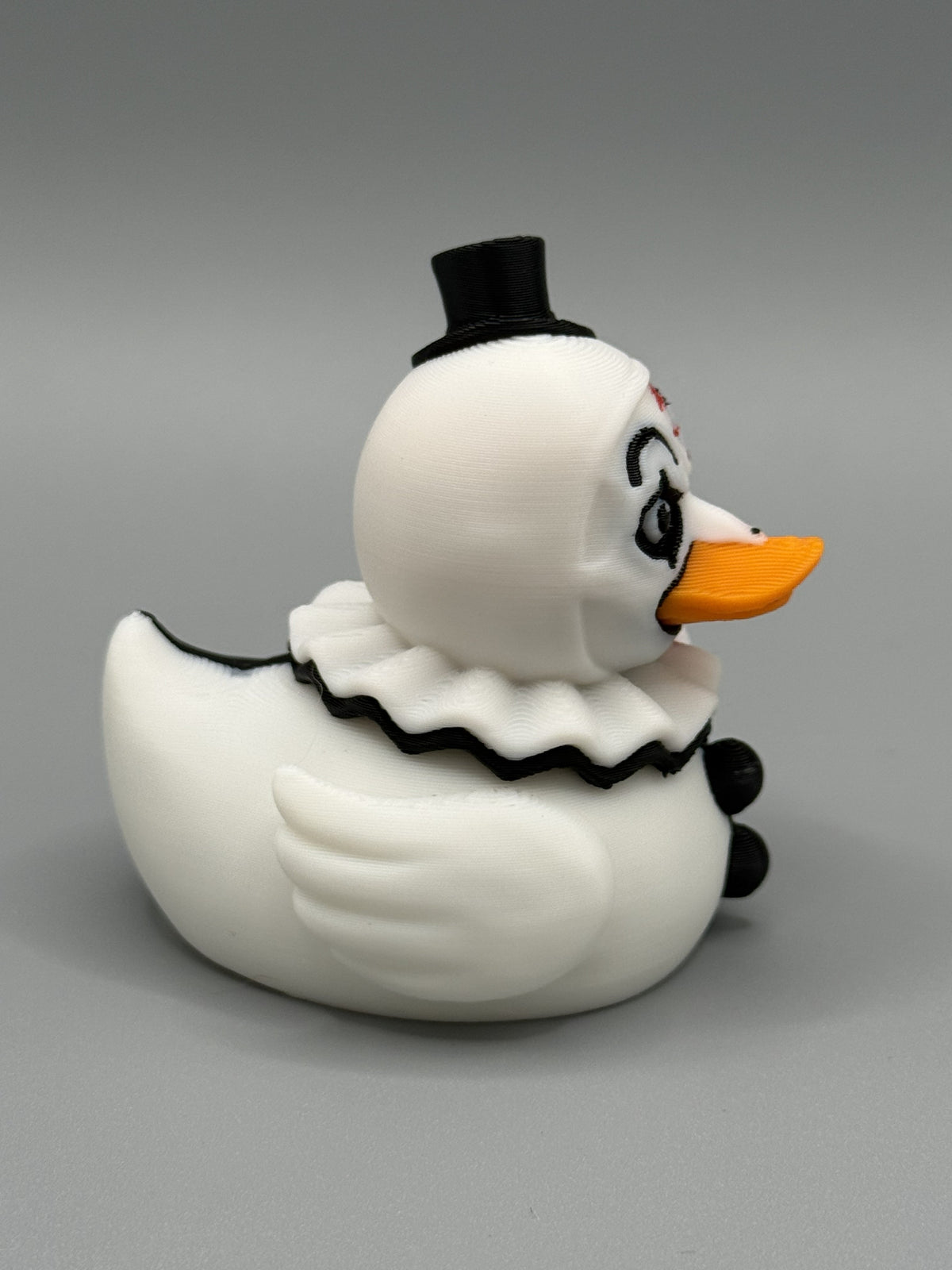 Art the Clown Duck front view – blood-splattered face and black eye makeup