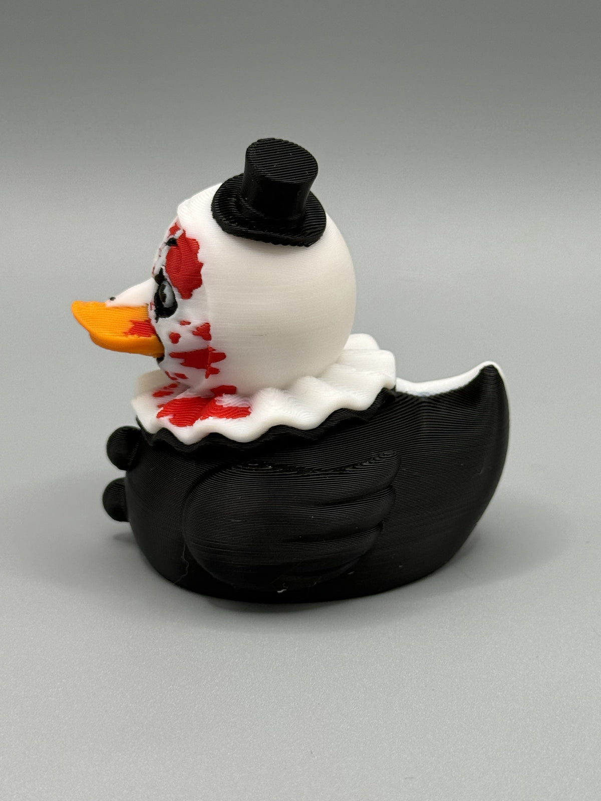 Art the Clown Duck back view – showing black and white split body detail
