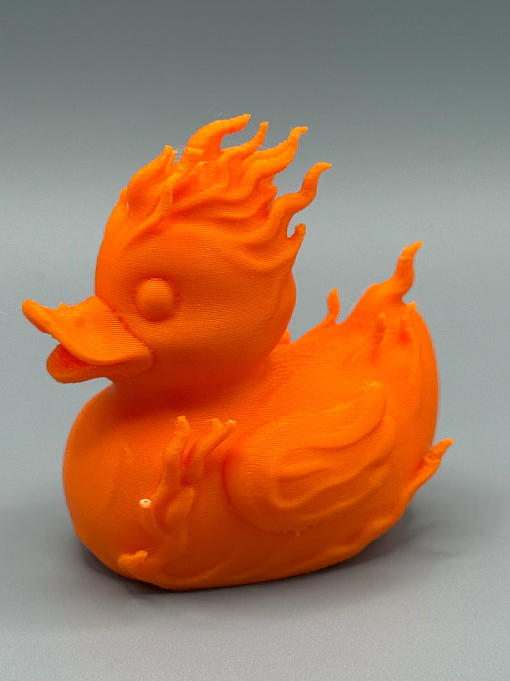 Fantastic 4 Human Torch Duck – side view showing full orange flame body and crown of fire